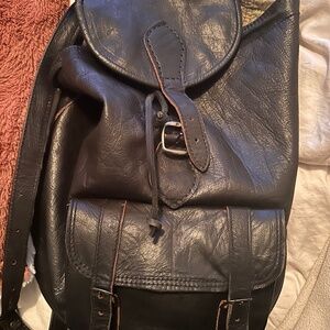 Black rucksack backpack